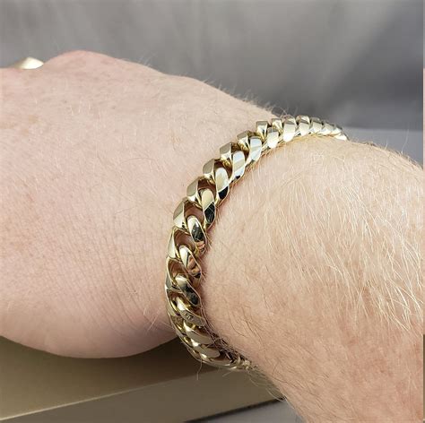 pulseras oro 14 k .